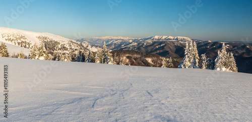 Nizke Tatry mountains from hiking trail near Koniarky signpost in winter Velka Fatra mountains in Slovakia photo