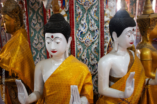 Ancient buddha statue in antique old ubosot for local thai people travelers travel visit respect blessing wish holy deity angel god worship mystery of Wat Si Uthumphon temple in Nakhon sawan, Thailand photo