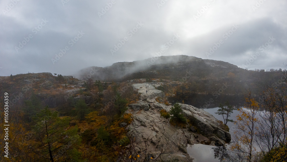 Misty Rocky Landscape with Calm Waters Misty Rocky Landscape with Calm Waters