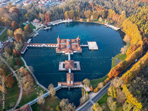 Heviz, Hungary - Aerial view of Lake Heviz, the world’s second-largest thermal lake and holiday spa destination at Zala county on autumn
 photo