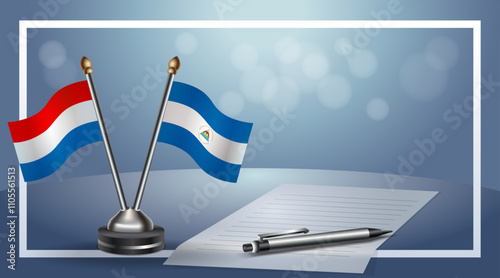 Netherlands and Nicaragua Small national flag on bokeh background, cooperative relationship
