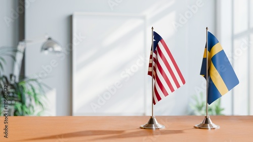 FLAGS OF LIBERIA AND SWEDEN ON TABLE photo