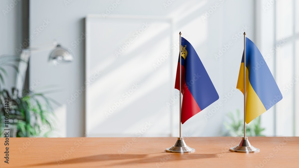 FLAGS OF LIECHTENSTEIN AND UKRAINE ON TABLE FLAGS OF LIECHTENSTEIN AND UKRAINE ON TABLE