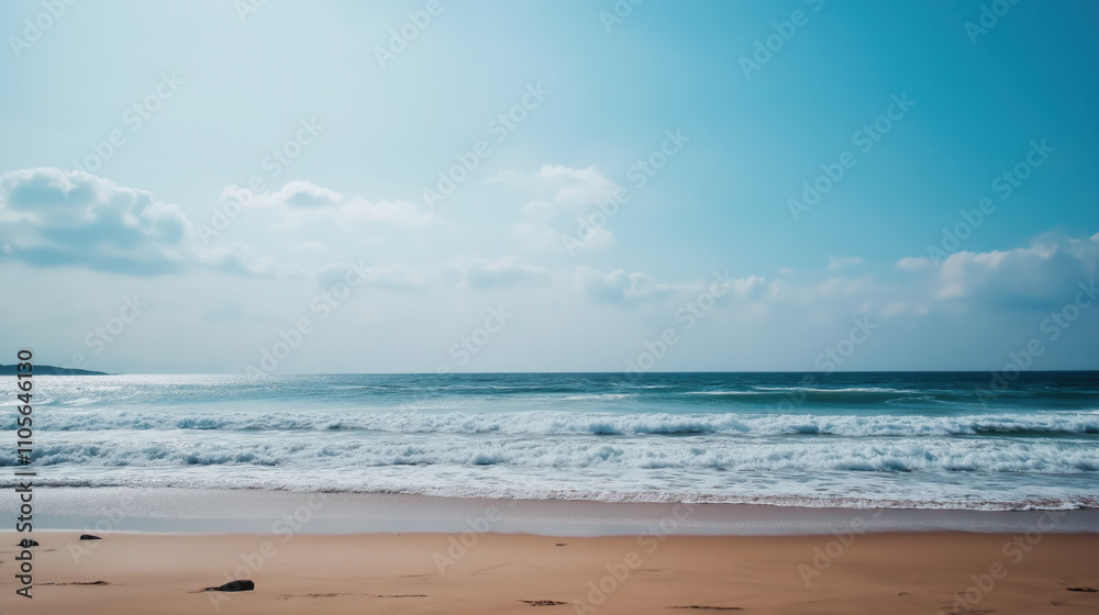 Ocean waves gently caress a golden shore, under a blue sky filled with soft clouds, offering a peaceful retreat into natures untouched beauty. Ocean waves gently caress a golden shore, under a blue sky filled with soft clouds, offering a peaceful retreat into natures untouched beauty.