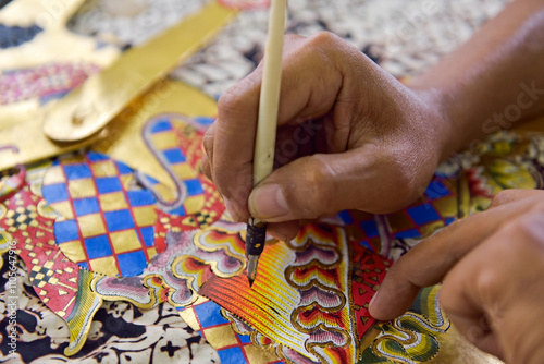 Workshop of puppets for shadow play (wayang kulit), Bima Art Shadow Puppet Maker, Sondakan district, Solo (Surakarta), Java island, Indonesia, Southeast Asia photo