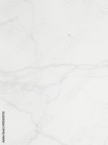 Smooth and elegant white marble texture with delicate veining, surface