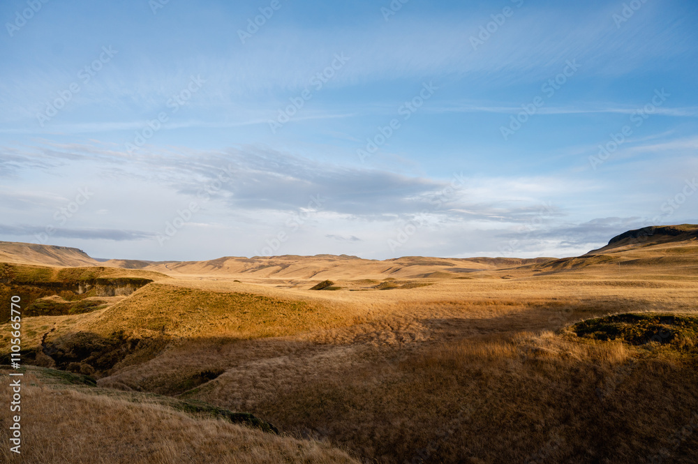 Icelandic minimalistic landscape. Beautiful autumn scenery. Green and yellow moss on hills. Cloudy sky. Icelandic minimalistic landscape. Beautiful autumn scenery. Green and yellow moss on hills. Cloudy sky.
