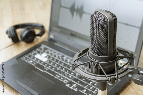 microphone and laptop recording podcast