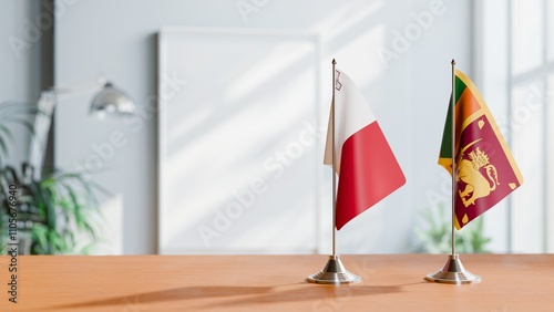 FLAGS OF MALTA AND SRI LANKA ON TABLE photo