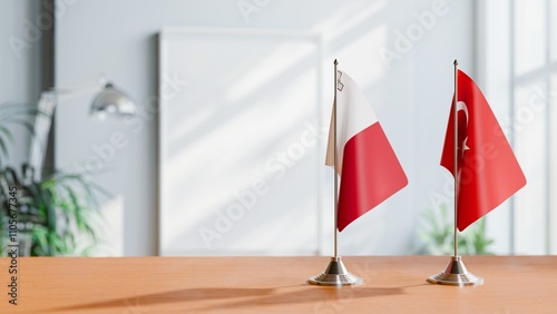 FLAGS OF MALTA AND TURKEY ON TABLE photo