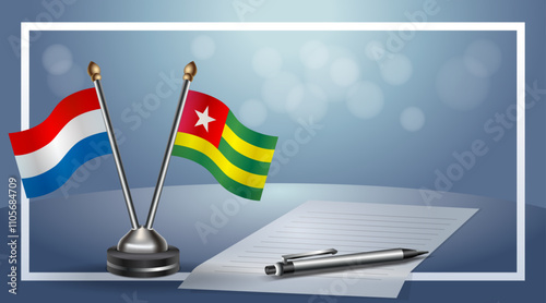 Netherlands and Togo Small national flag on bokeh background, cooperative relationship
