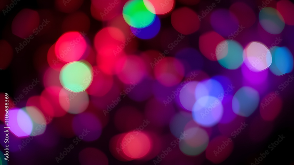 Abstract colorful bokeh with vivid red, green, and blue lights floating on a black grad Abstract colorful bokeh with vivid red, green, and blue lights floating on a black grad