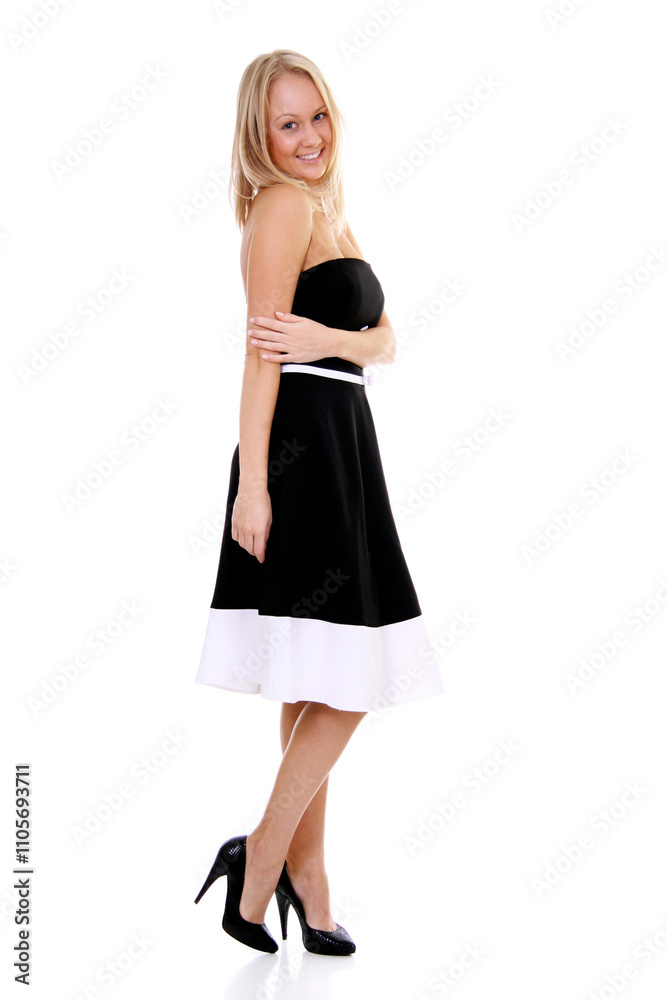 Portrait of a young beautiful blonde girl in a black dress Portrait of a young beautiful blonde girl in a black dress