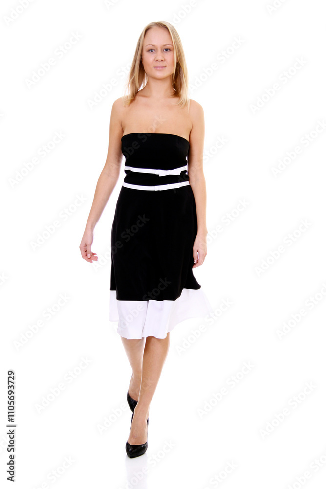 Portrait of a young beautiful blonde girl in a black dress Portrait of a young beautiful blonde girl in a black dress