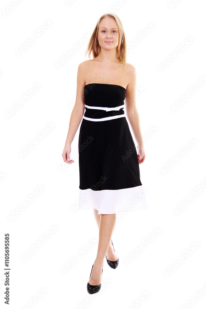 Portrait of a young beautiful blonde girl in a black dress Portrait of a young beautiful blonde girl in a black dress
