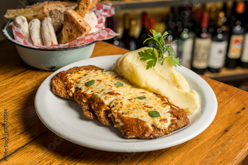 Milanese Neapolitan with mashed potatoes ready to eat
