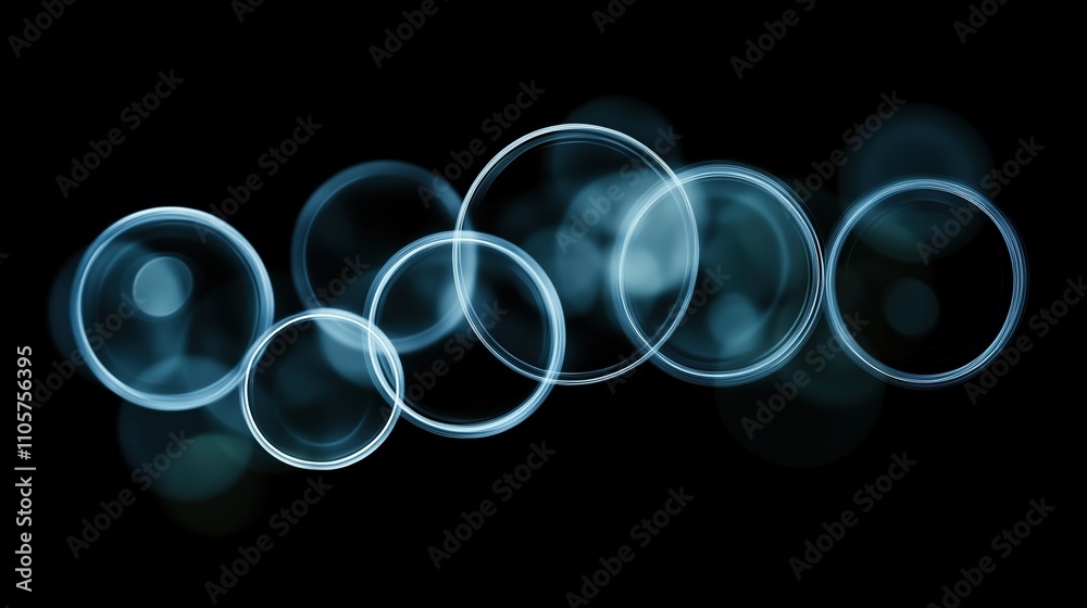 Abstract glowing blue bubbles on black background Abstract glowing blue bubbles on black background