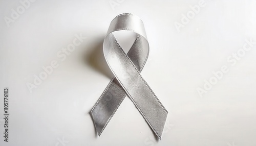 Silver Awareness Ribbon. Symbol of Hope, Unity, and Awareness for Brain Disorders, Mental Health, Disabilities, and Rare Diseases. Advocacy, Support, and Meaningful Representation Worldwide photo