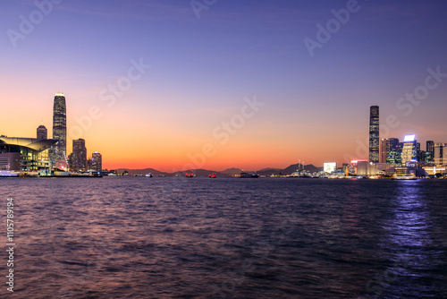 Photography Vibrant Sunset Over Hong Kong's Iconic Skyline and Victoria Harbour