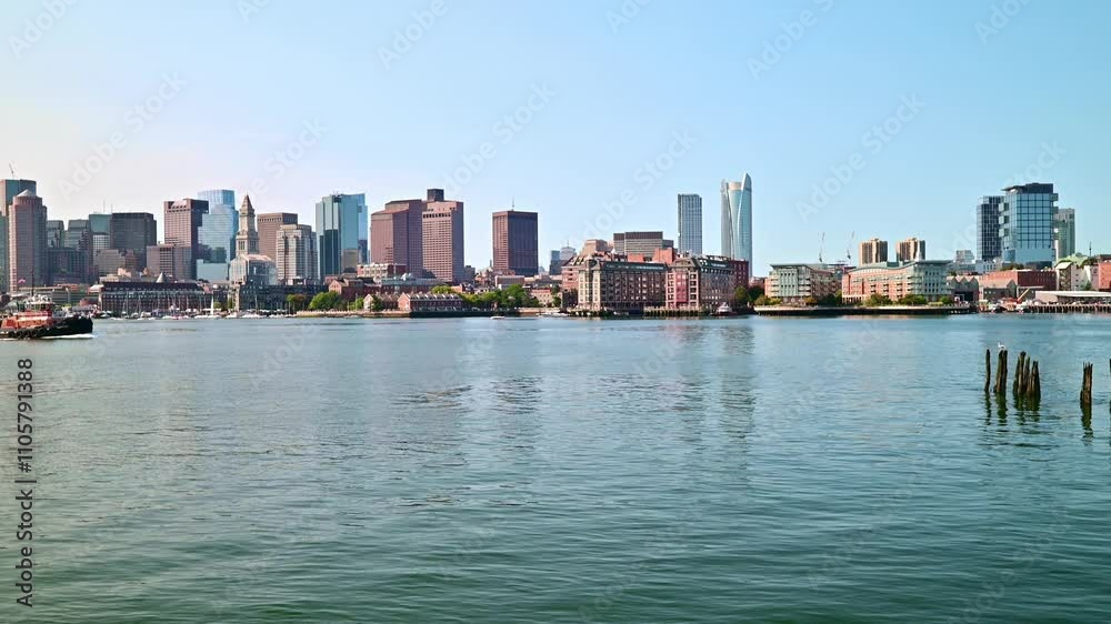 The skyline of the iconic Boston in Massachusetts, USA as seen from East Boston on a sunny morning. The skyline of the iconic Boston in Massachusetts, USA as seen from East Boston on a sunny morning.