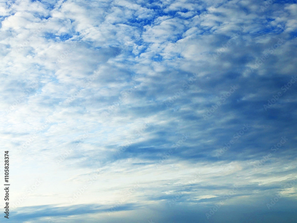 Big White Fluffy Clouds on A Blue Sky With Fine Whispy Lines Big White Fluffy Clouds on A Blue Sky With Fine Whispy Lines