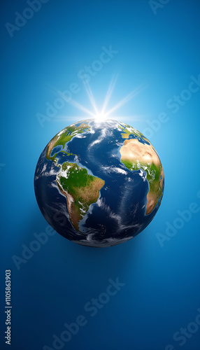 Globe depicting Earth with sunlight shining over the oceans and continents