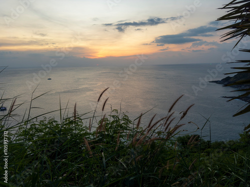 Promthep cape viewpoint at sunset in Phuket, Thailand. photo