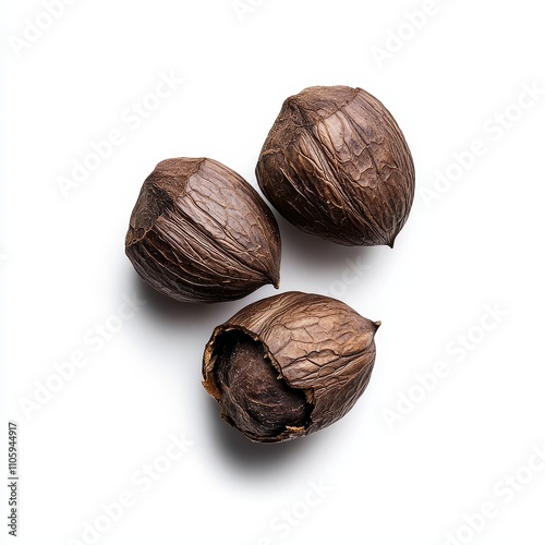 Dried Malva Nuts with Wrinkled Surfaces and Dark Brown Tones for Culinary photo