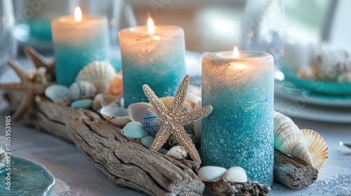 A beach-inspired table centerpiece made driftwood, seashells, and candles in ocean blue hues. photo
