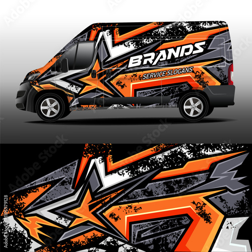 Cargo van wrap designs. Car decal. Graphic abstract orange and grey grunge stripes on black background for car branding. Modern camouflage design for car vinyl wrap.