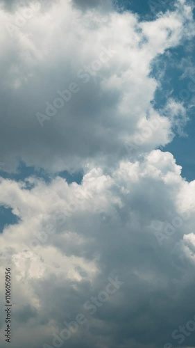 Wallpaper Mural Vertical video - Timelapse of thick storm clouds brewing under the blue sky Torontodigital.ca