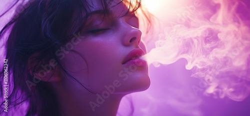 Woman exhaling vapor in purple light.