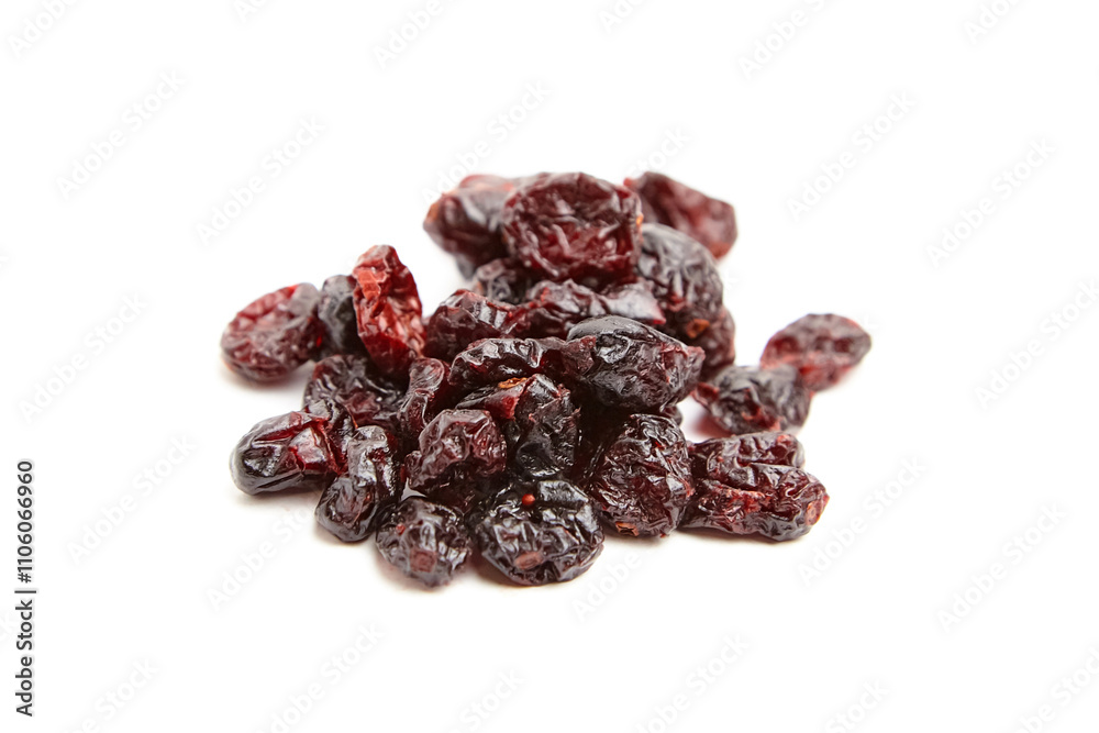 A compact pile of dried cranberries with wrinkled textures and deep red hues, isolated on a white background. Perfect for healthy snacks or cooking A compact pile of dried cranberries with wrinkled textures and deep red hues, isolated on a white background. Perfect for healthy snacks or cooking