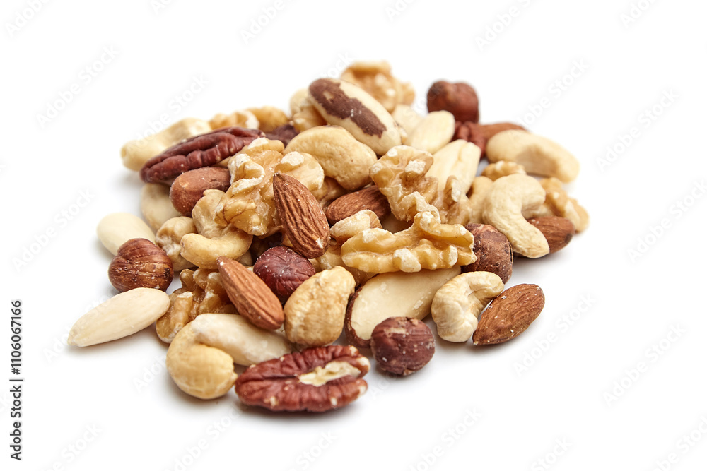 Close-up of assorted nuts mix including almonds, cashews, hazelnuts, pecans, walnuts, and Brazil nuts, isolated on a white background. Perfect for a healthy snack Close-up of assorted nuts mix including almonds, cashews, hazelnuts, pecans, walnuts, and Brazil nuts, isolated on a white background. Perfect for a healthy snack