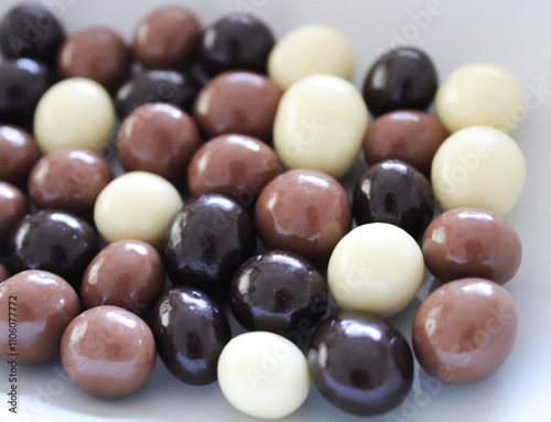 Mix of chocolate balls ,milk, dark and white chocolate
