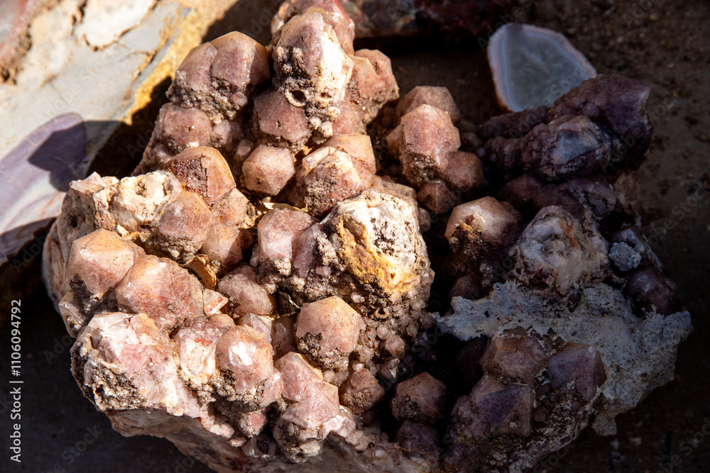 Close-up of crystalline stone with prismatic structures in earthy colors Close-up of crystalline stone with prismatic structures in earthy colors