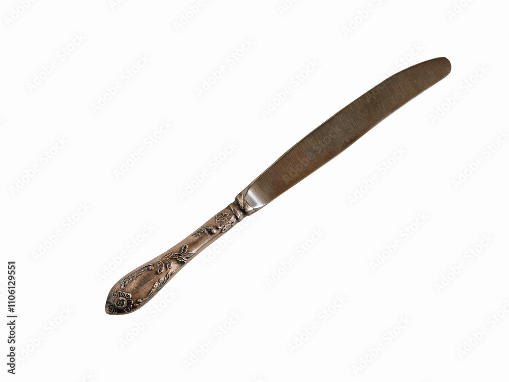 silver decorated knife on a white background silver decorated knife on a white background
