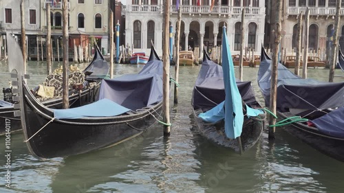 Gondolas floating on canal in venice italy