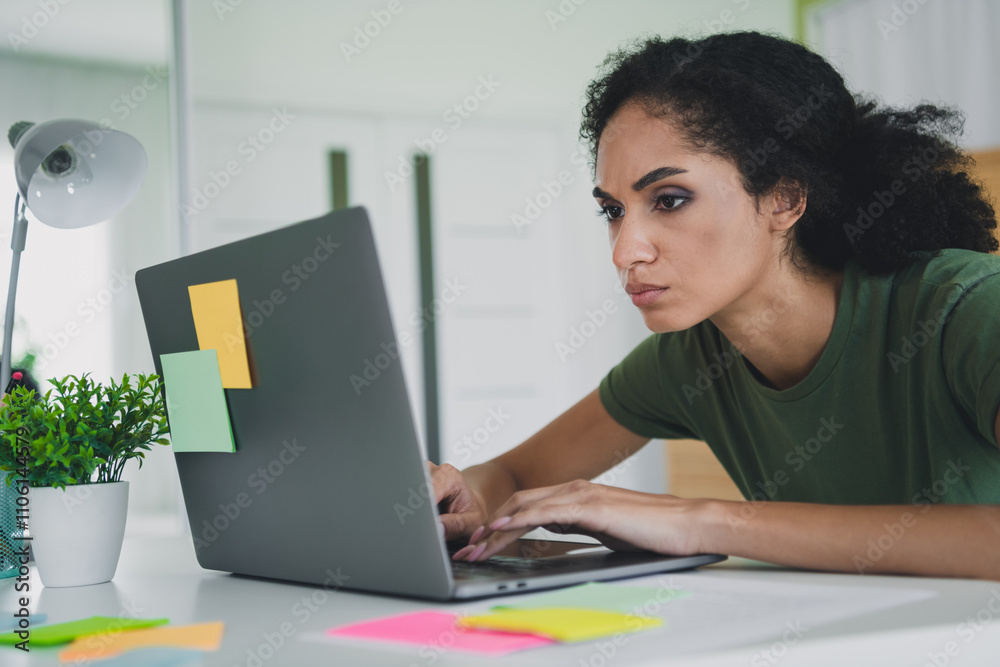 Photo of attractive young woman stressed work netbook tired dressed green outfit cozy day light home office interior living room Photo of attractive young woman stressed work netbook tired dressed green outfit cozy day light home office interior living room