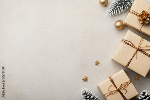 Elegant arrangement of golden gifts with festive decorations on a white backg...