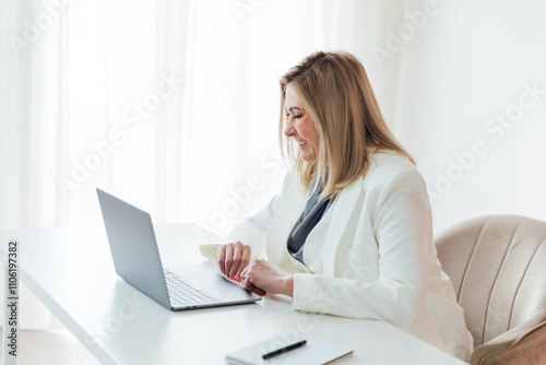 Business woman 45 years old with laptop study in office