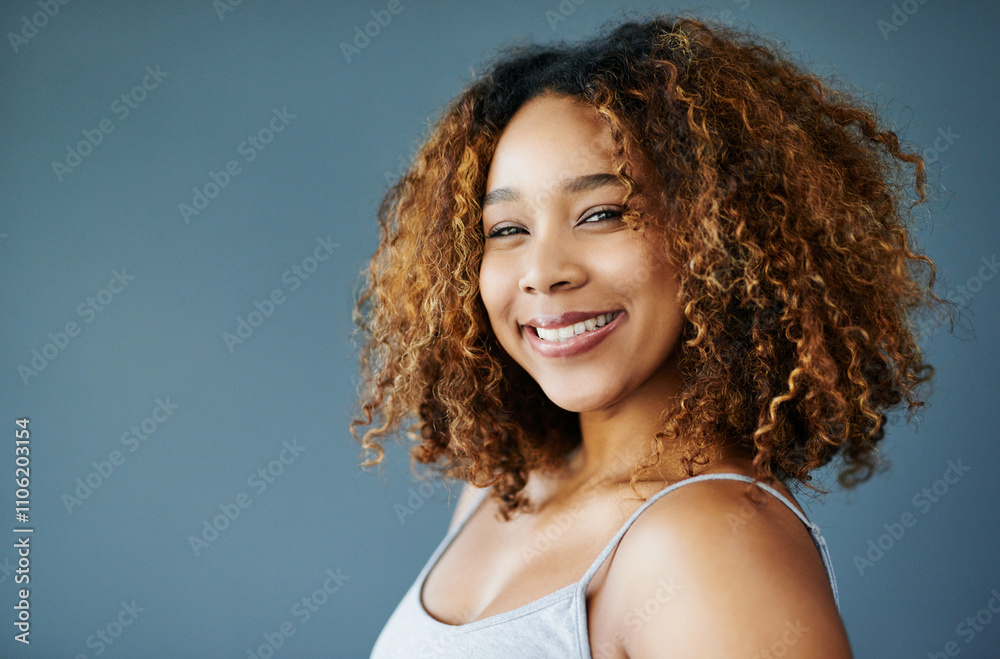 Happy, African woman or mockup for hair care, portrait or natural afro for skincare beauty or cosmetics. Gray background, healthy glow space or confident model in studio with smile or pride in Brazil Happy, African woman or mockup for hair care, portrait or natural afro for skincare beauty or cosmetics. Gray background, healthy glow space or confident model in studio with smile or pride in Brazil
