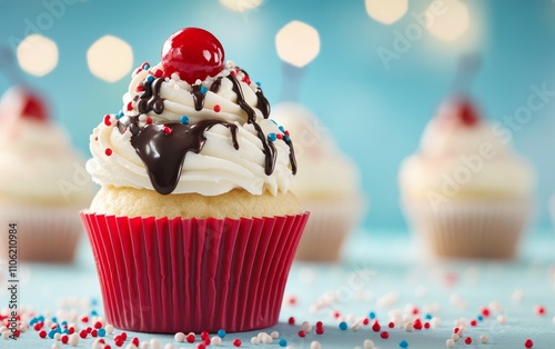 A beautifully decorated cupcake featuring fluffy frosting swirled with chocol...