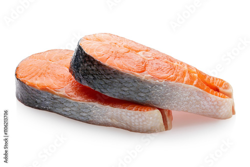 Two fresh raw salmon steaks lying on each other isolated on white background, sharpness across the entire object