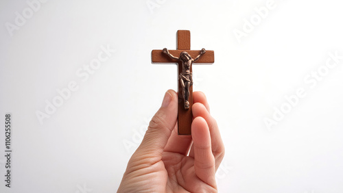 hand holding a cross photo