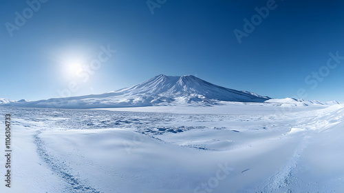 A beautiful panoramic view of a snow-covered mountain with a clear sky