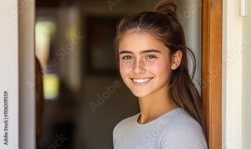 15-year-old woman, standing in a doorway, pretty, brown hair, friendly, ponytail, smiling