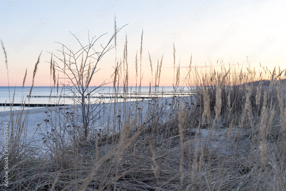 At the Baltic Sea in Germany with blue sky in winter time At the Baltic Sea in Germany with blue sky in winter time