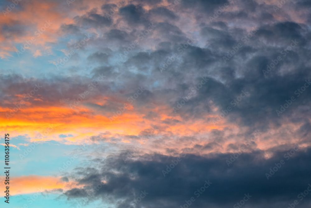 Sunset with beautiful rain clouds drifting across the sky Sunset with beautiful rain clouds drifting across the sky