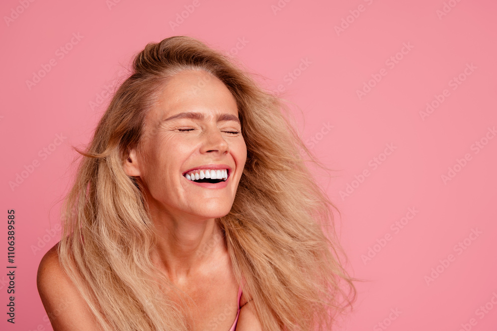 Photo of cheerful happy lovely charming woman laughing clear healthy skin isolated on pink color background